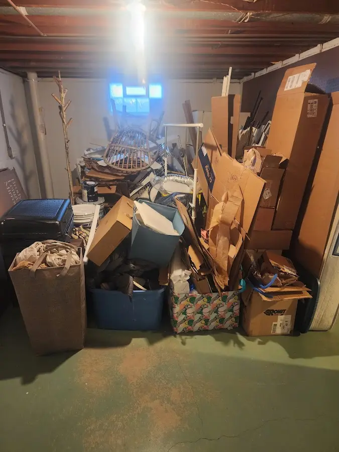 Roll-off dumpster container at job site for 15 Yard Dumpster Rental in Scott